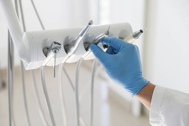 Professional Tooth Extraction technician working in La Croft, OH